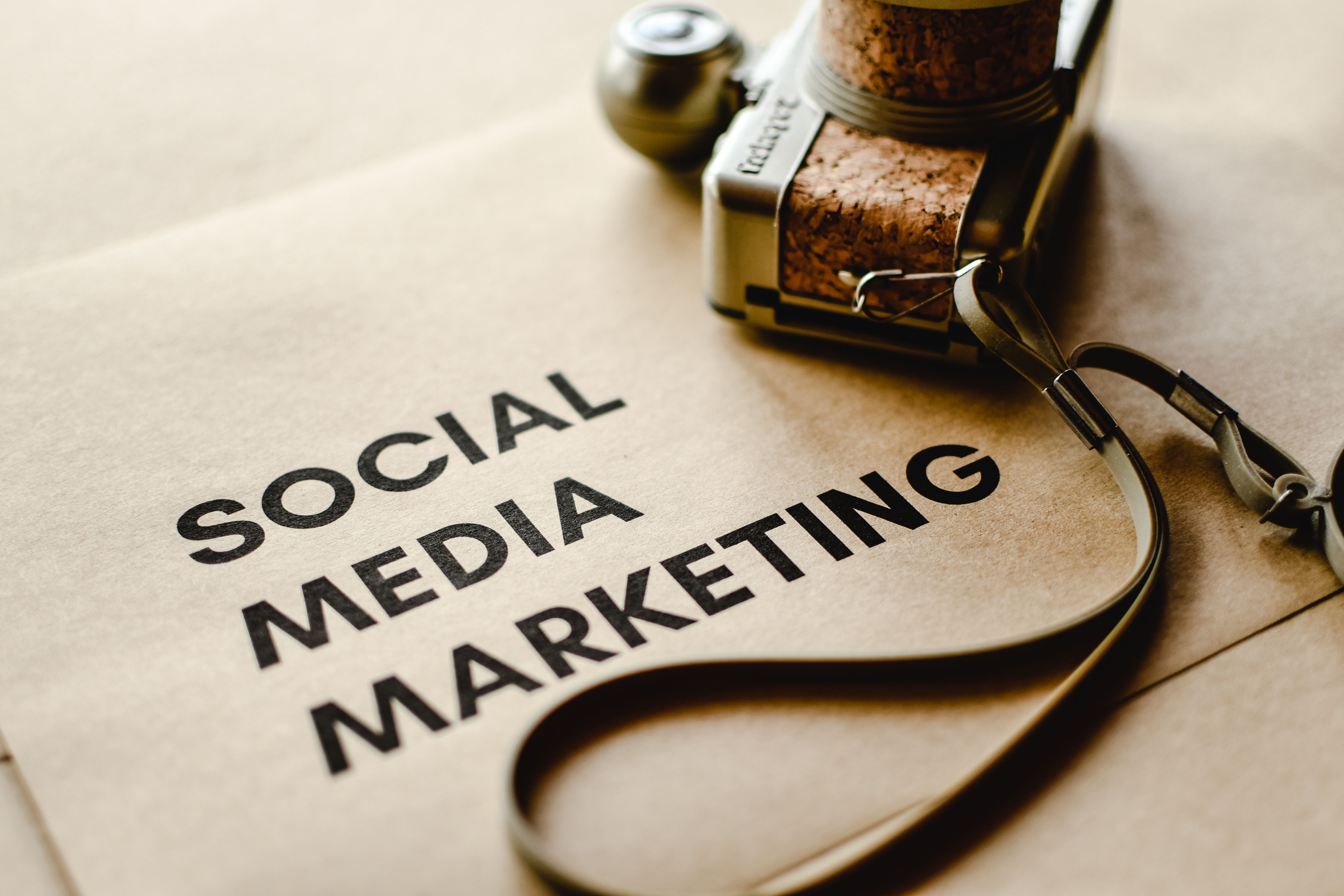 A camera beside the words Social Media Marketing